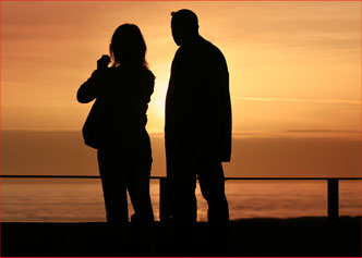 Image of A Couple In Silhouette Against The Sunset Looking For Resources